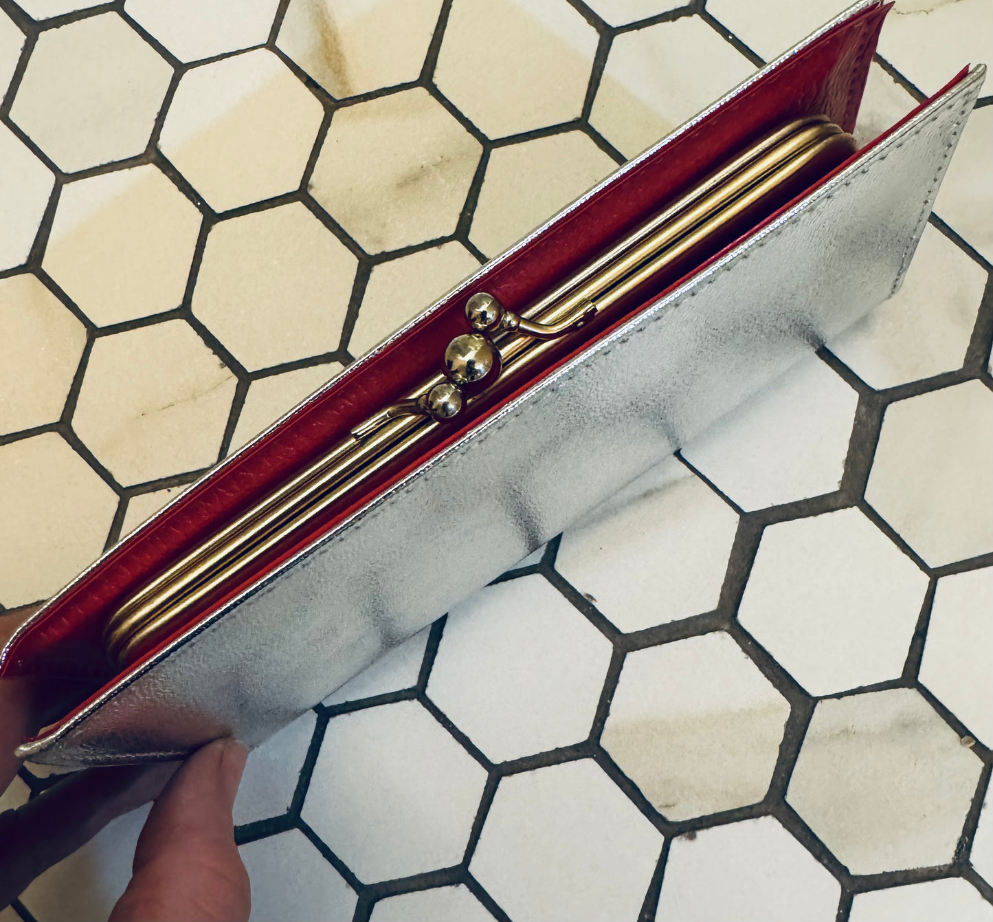 Vintage 1960s kiss lock silver clutch with red leather lining