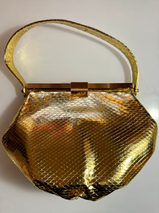 1960s Vintage Givenchy gold bag with jewel hardware