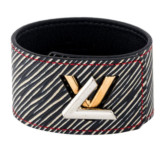 Never worn vintage Louis Vuitton 2015 collection Twist it Bracelet. Brass, gold and palladium plated. Made in Spain