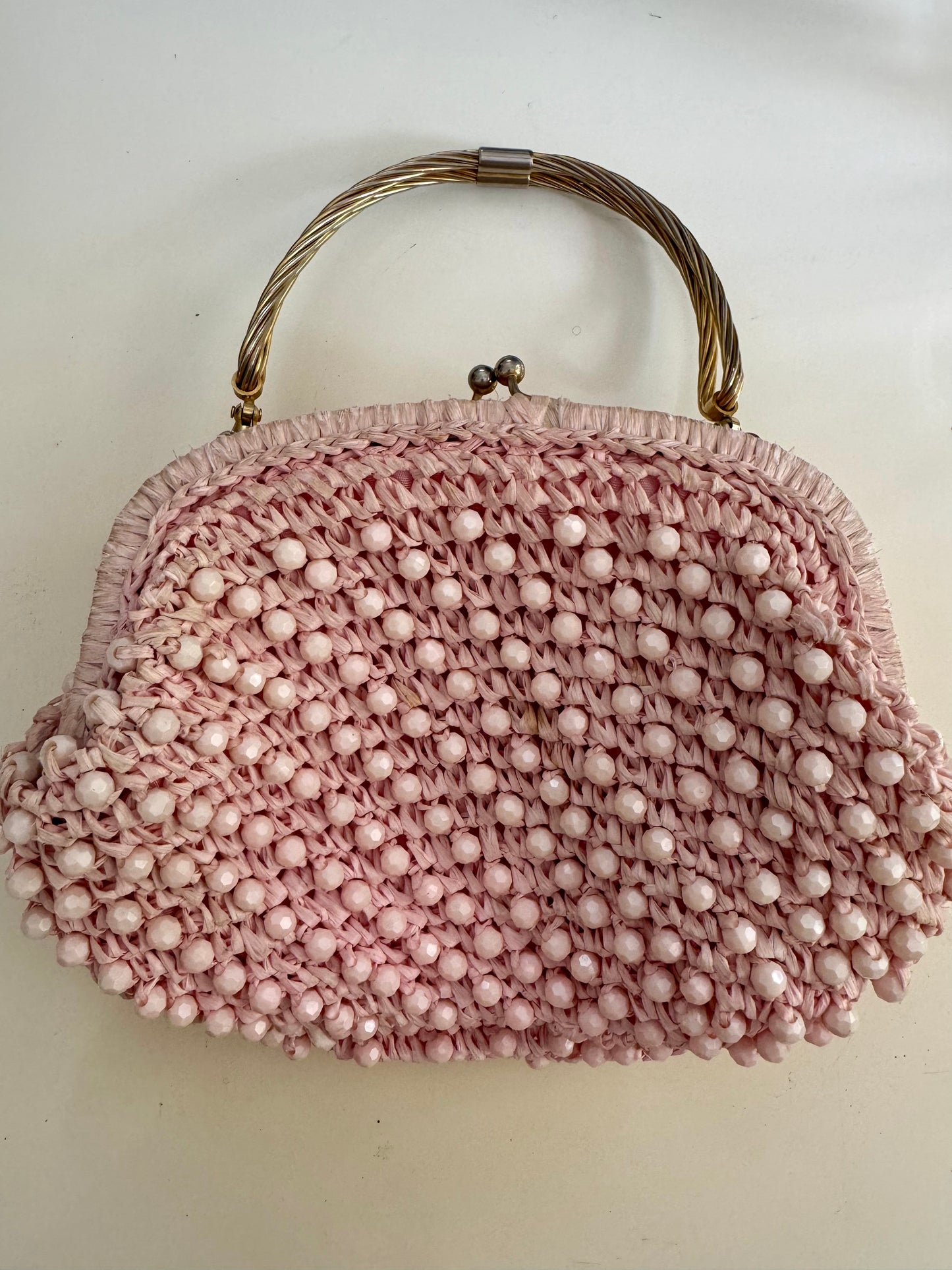 1960s vintage raffia light pink double sided handbag with unique gold hardware