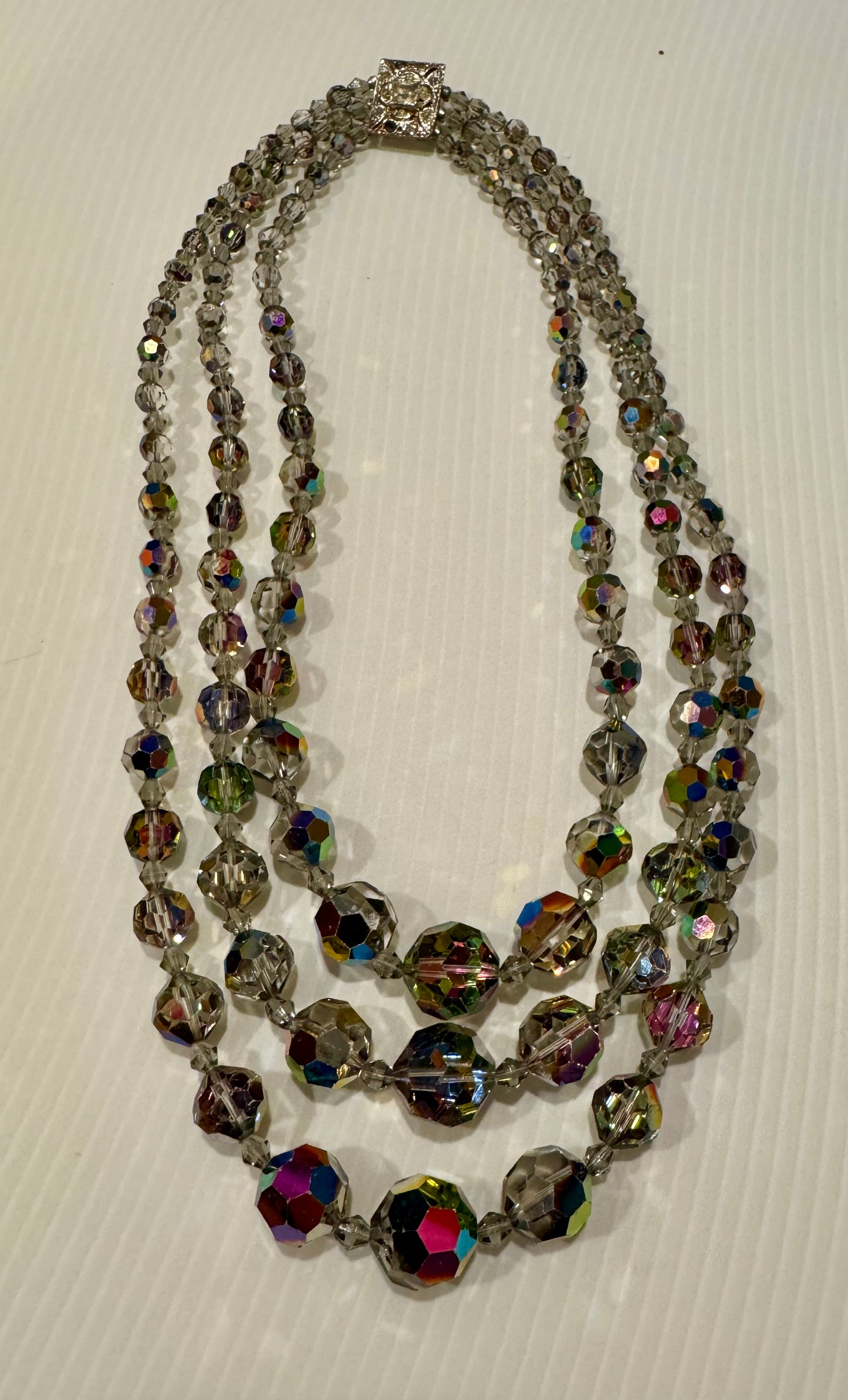 Stunning and sparkly 3 strand jet bead necklace from 1950s. Clasp is missing 2 small rhinestones - hard to see