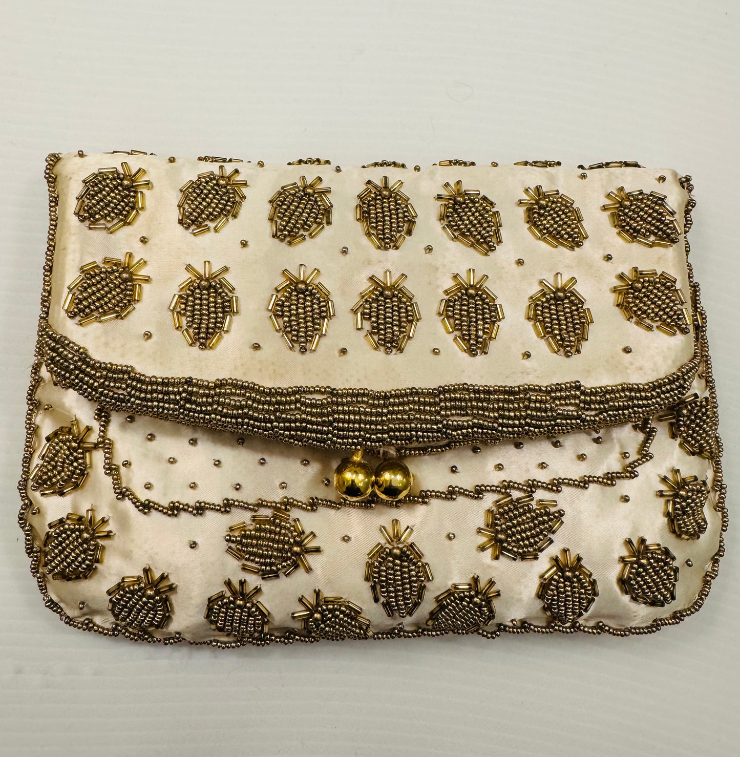 Stunning vintage silk clutch with gold beads in original box with original note