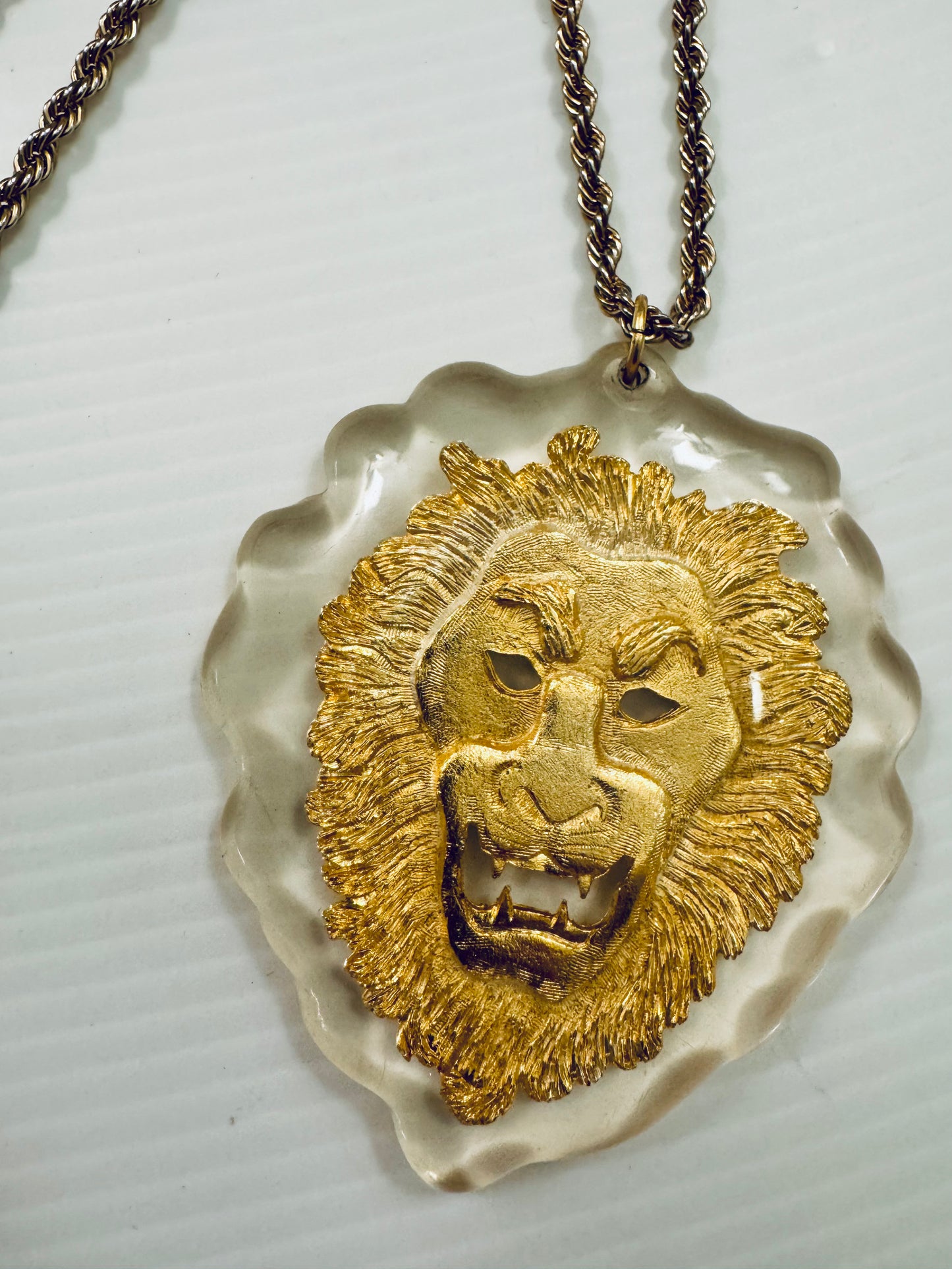 Vintage lucite with gold lion pendant