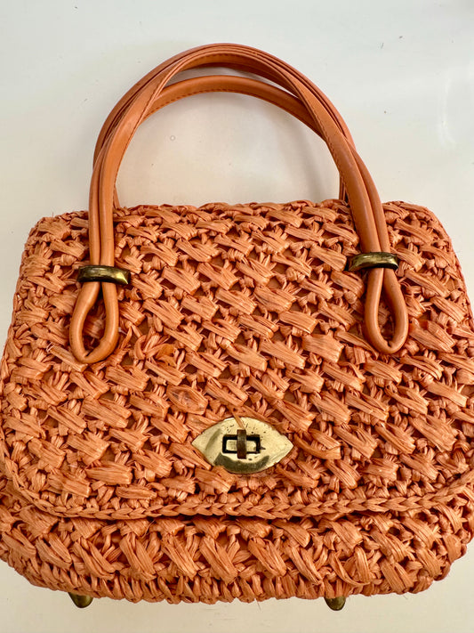 Light vintage tangerine orange raffia handbag with gold tone hardware and double compartment