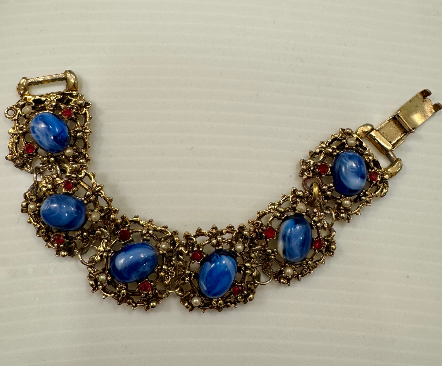 1950s goldtone with blue center stones pearl and red rhinestone bracelet