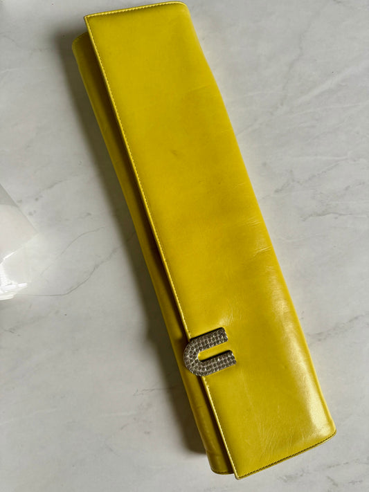 Yellow elongated Emanuel Ungaro clutch / shoulder bag with pink lining and rhinestone U