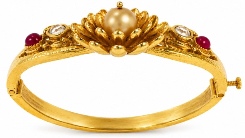 Beautiful retro clamper bracelet with faux pearl and ruby colored stones