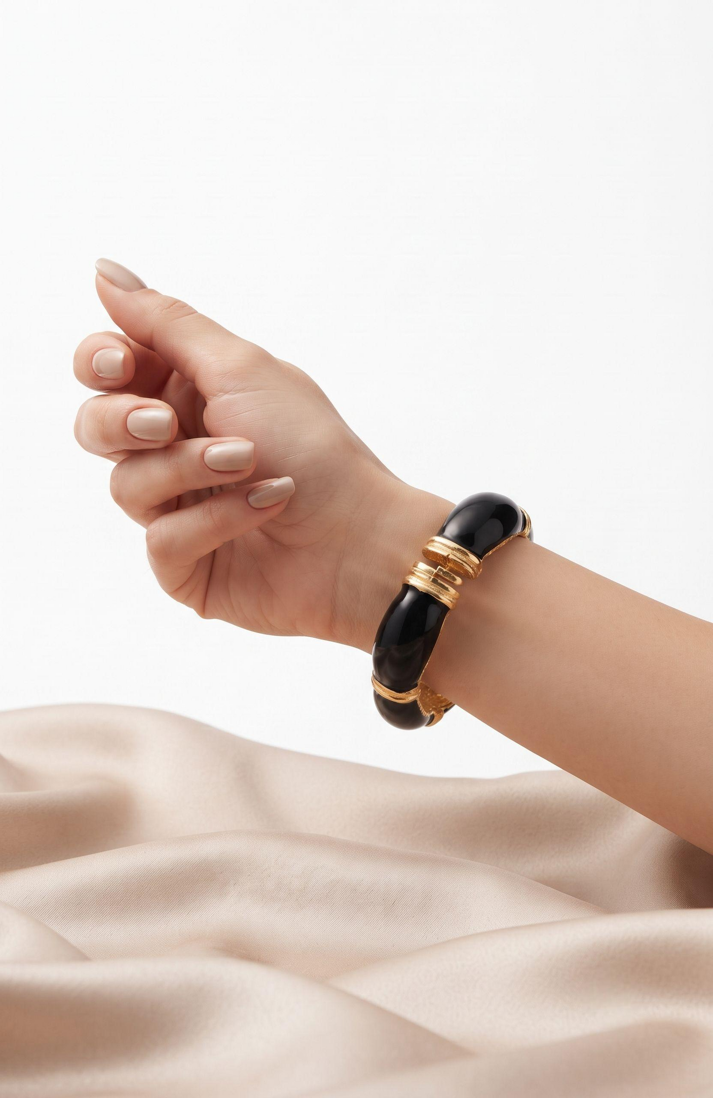 Beautiful 1970s gold tone and black enamel clamper bracelet