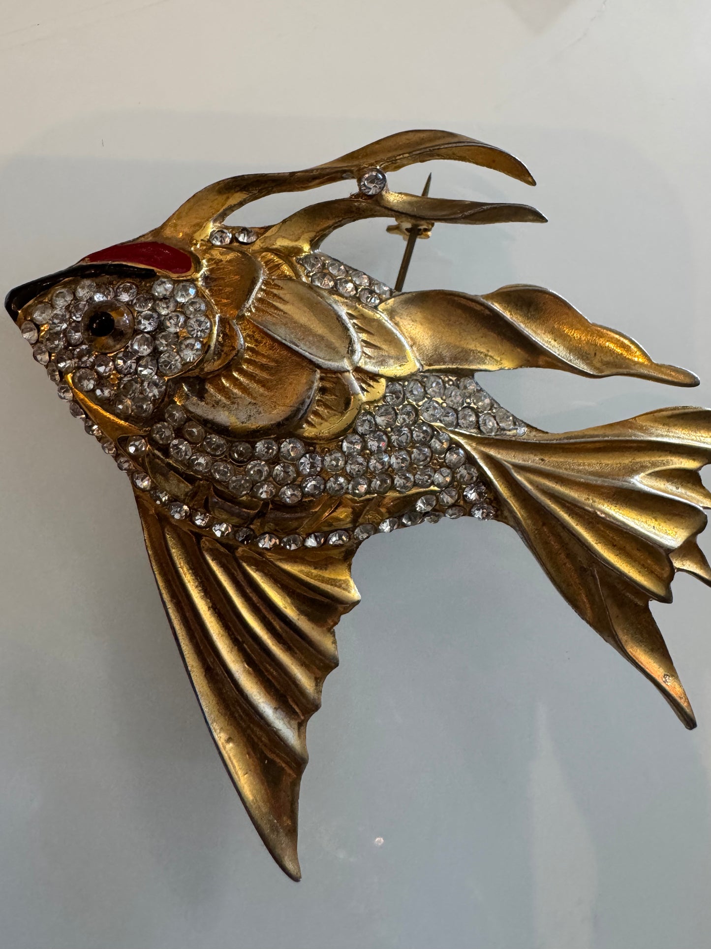 1940s fish brooch with glass eye and rhinestone/ enamel body