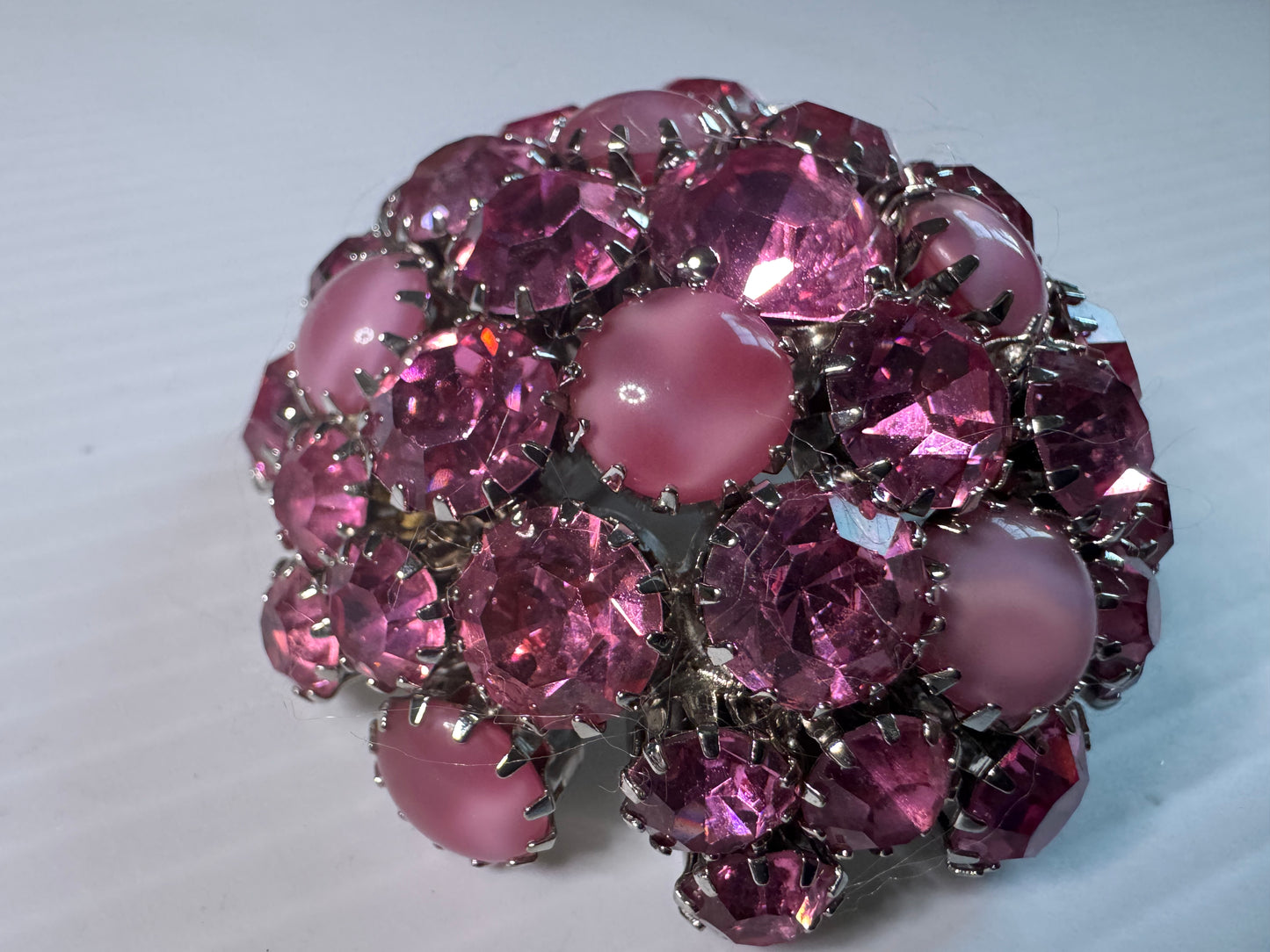 1940s dome pink rhinestone brooch, signed WARNER