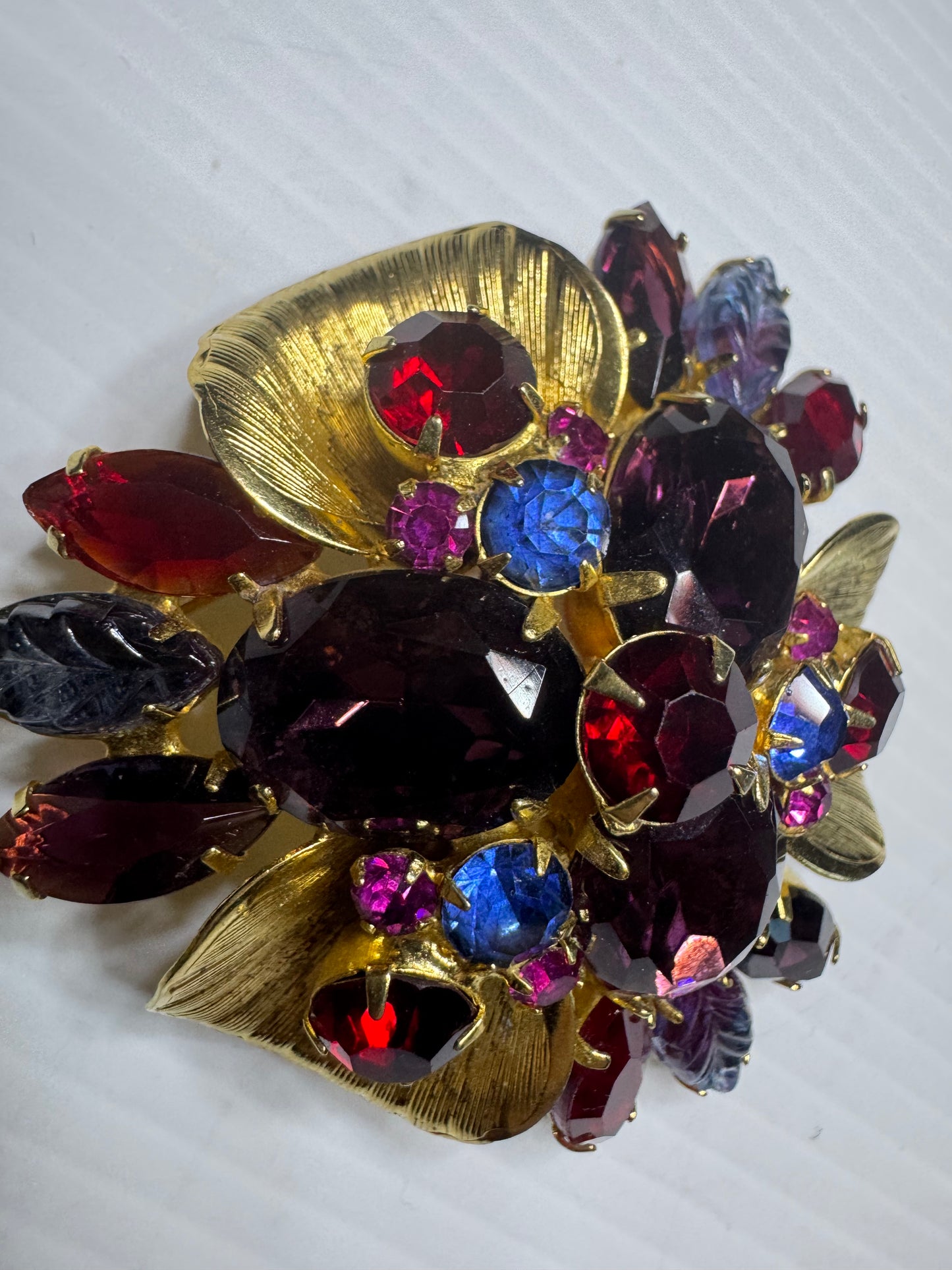 DELIZZA & ELSTER beautiful vintage brooch with purple blue, magenta, and red rhinestones