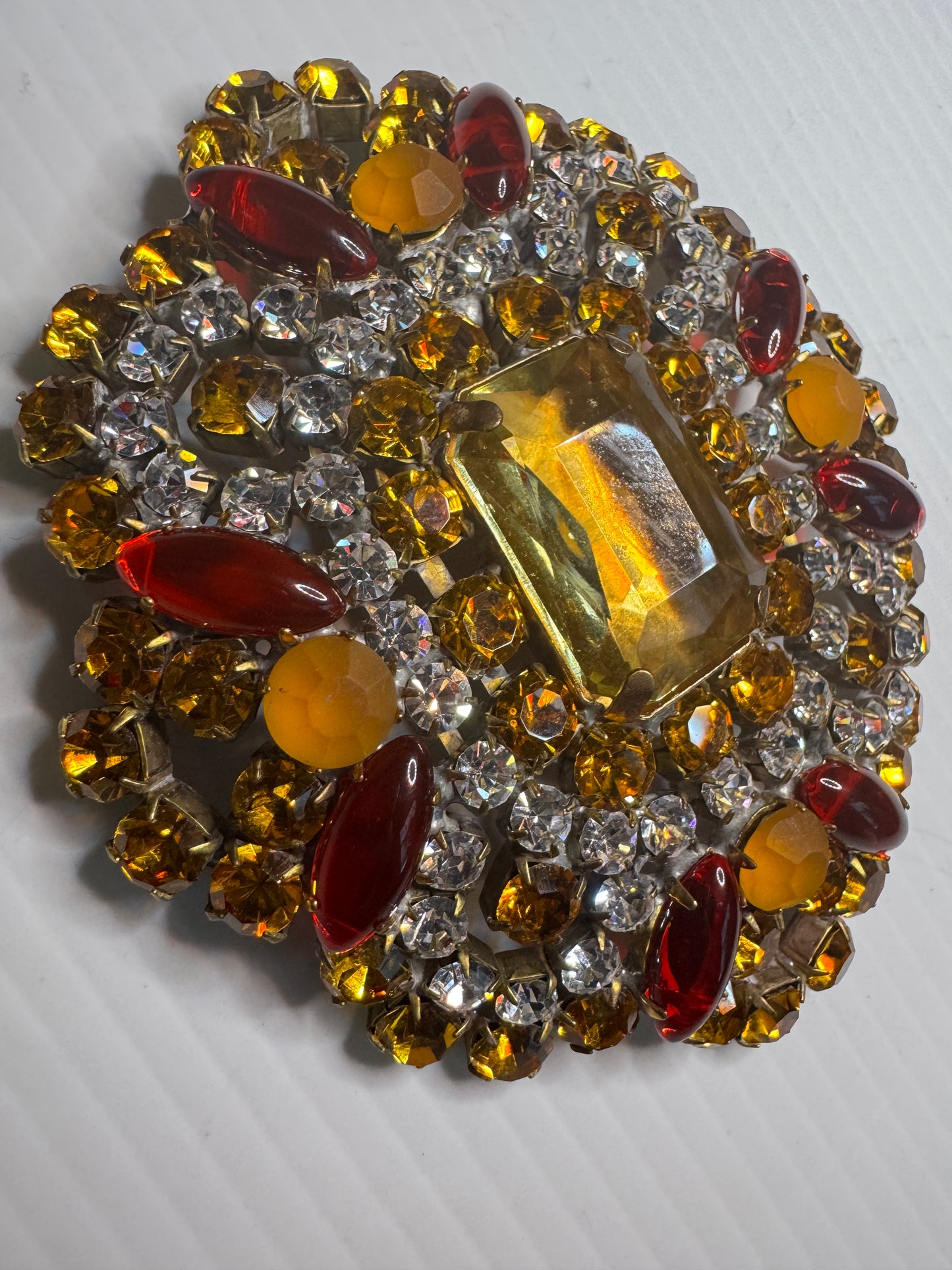 Vintage signed BIJOUX jumbo rhinestone brooch featuring orange, yellow, and clear rhinestone