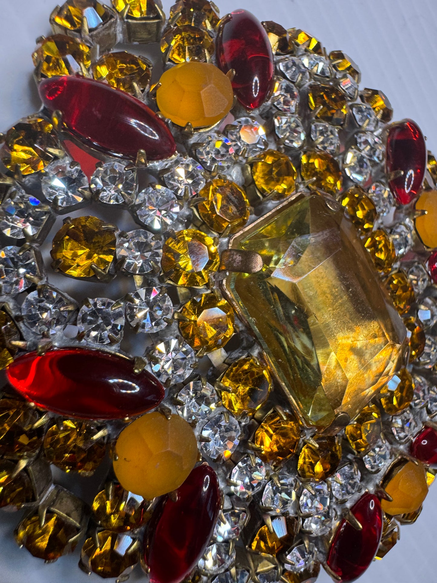 Vintage signed BIJOUX jumbo rhinestone brooch featuring orange, yellow, and clear rhinestone