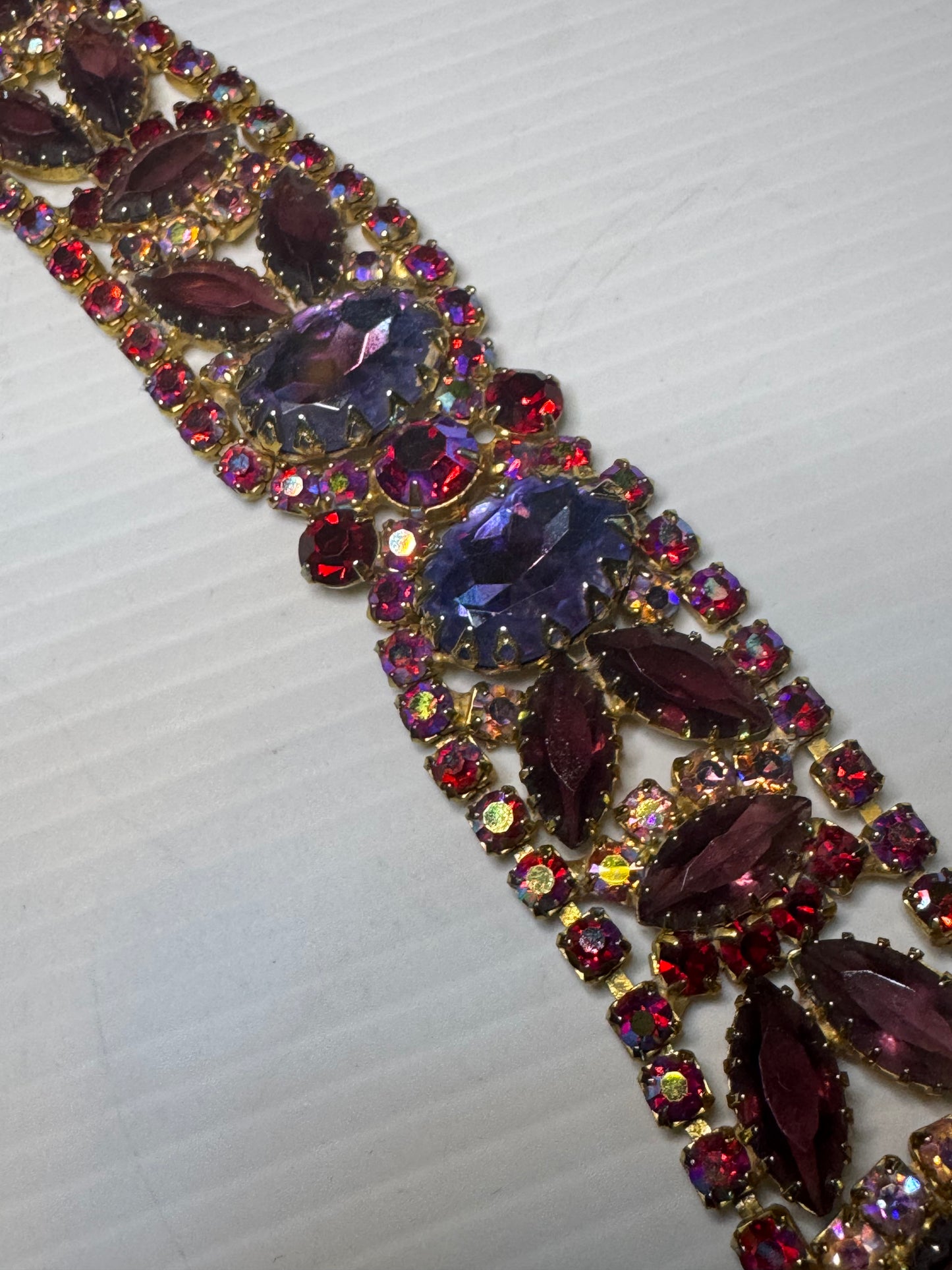 Beautiful 1940s rhinestone bracelet in with red and purple rhinestones and aurora borealis