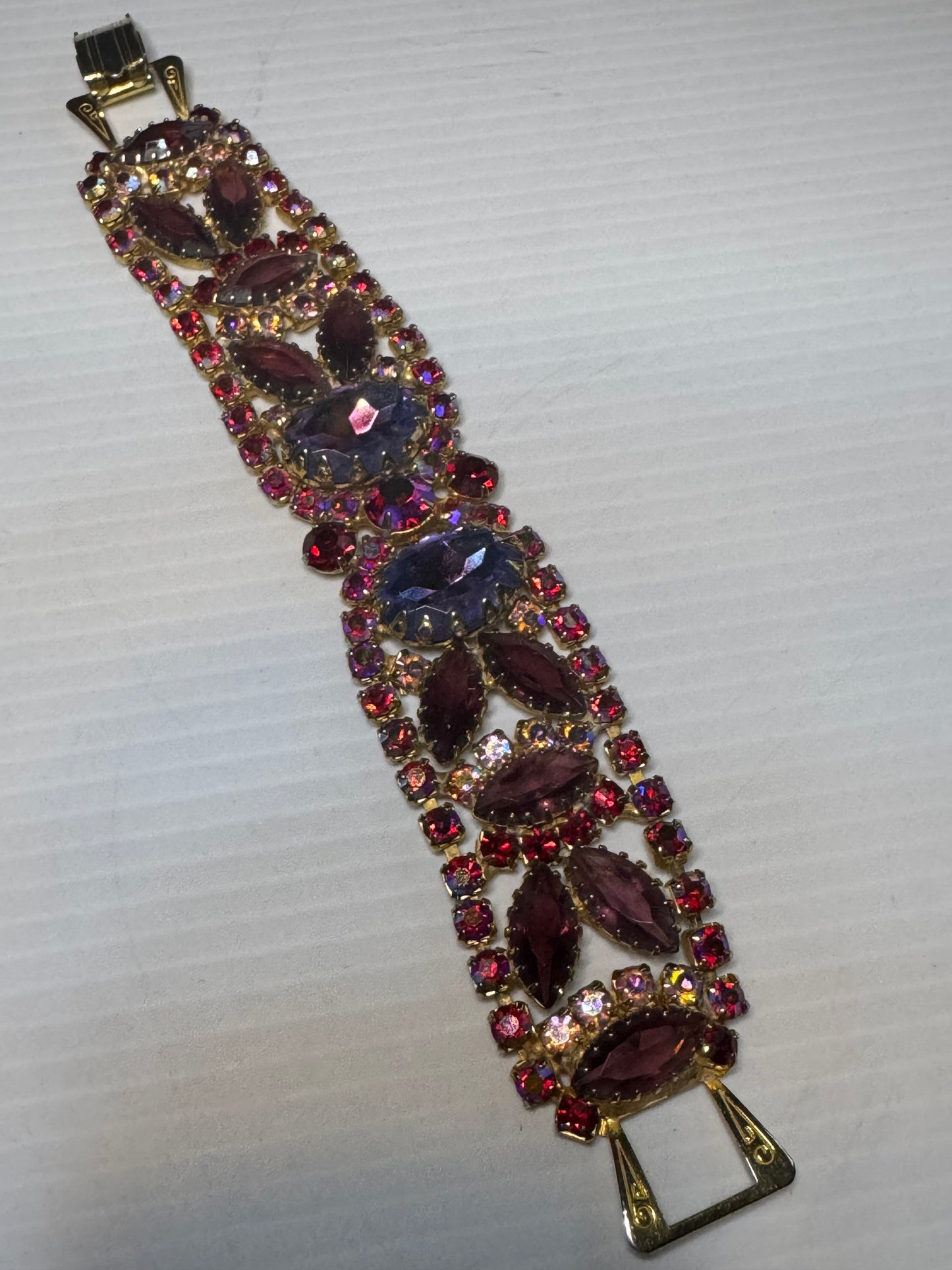 Beautiful 1940s rhinestone bracelet in with red and purple rhinestones and aurora borealis