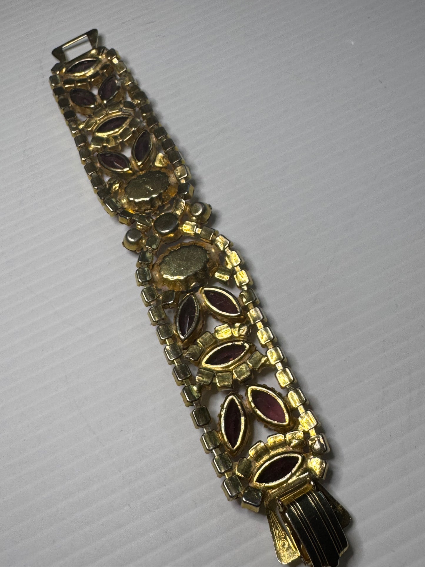 Beautiful 1940s rhinestone bracelet in with red and purple rhinestones and aurora borealis