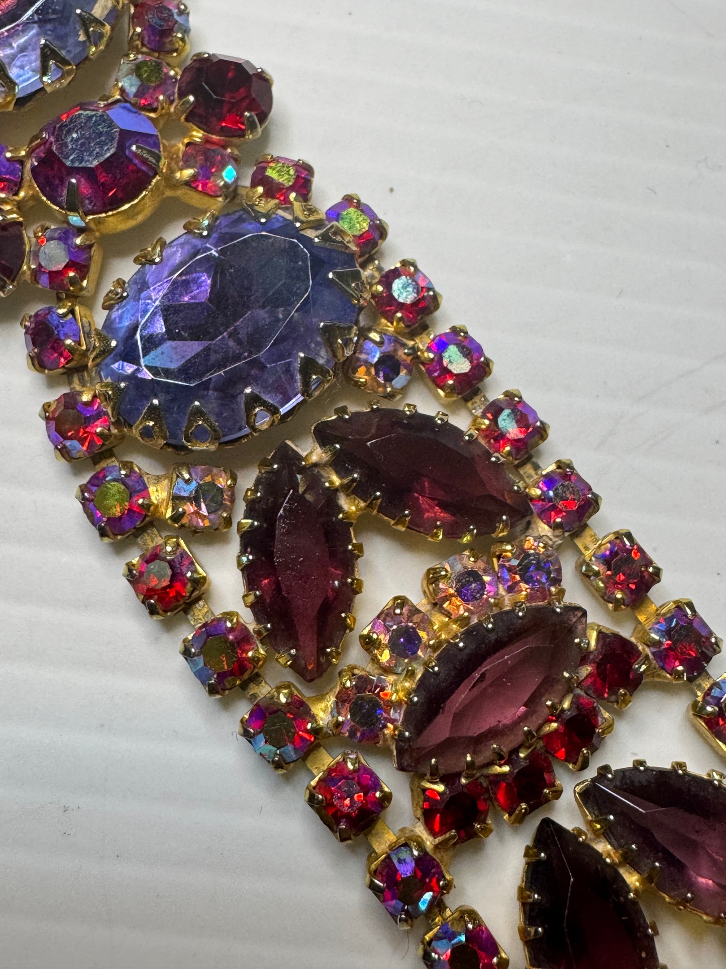 Beautiful 1940s rhinestone bracelet in with red and purple rhinestones and aurora borealis