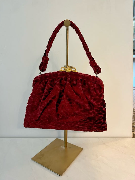 Vintage red velvet top handle bag with gold tone bow closure