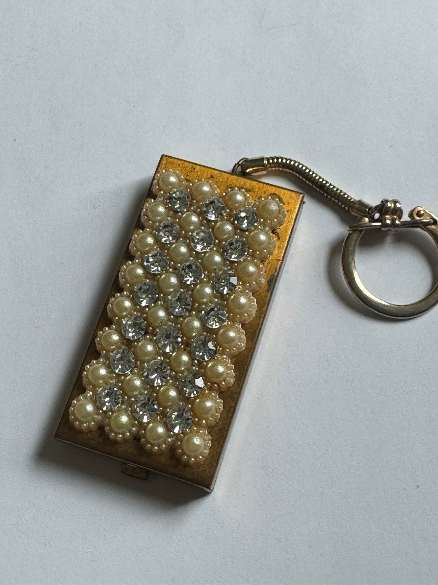 1970s decorative keychain with compact