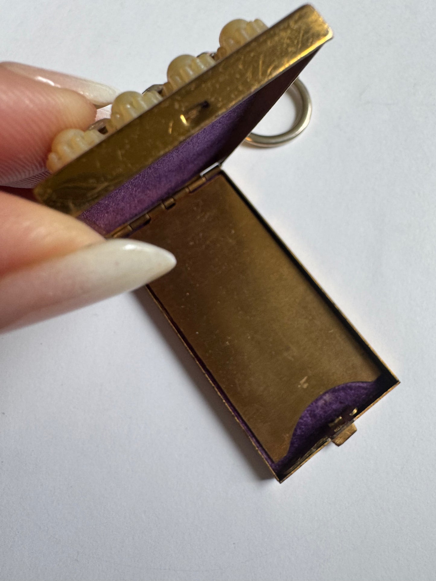 1970s decorative keychain with compact
