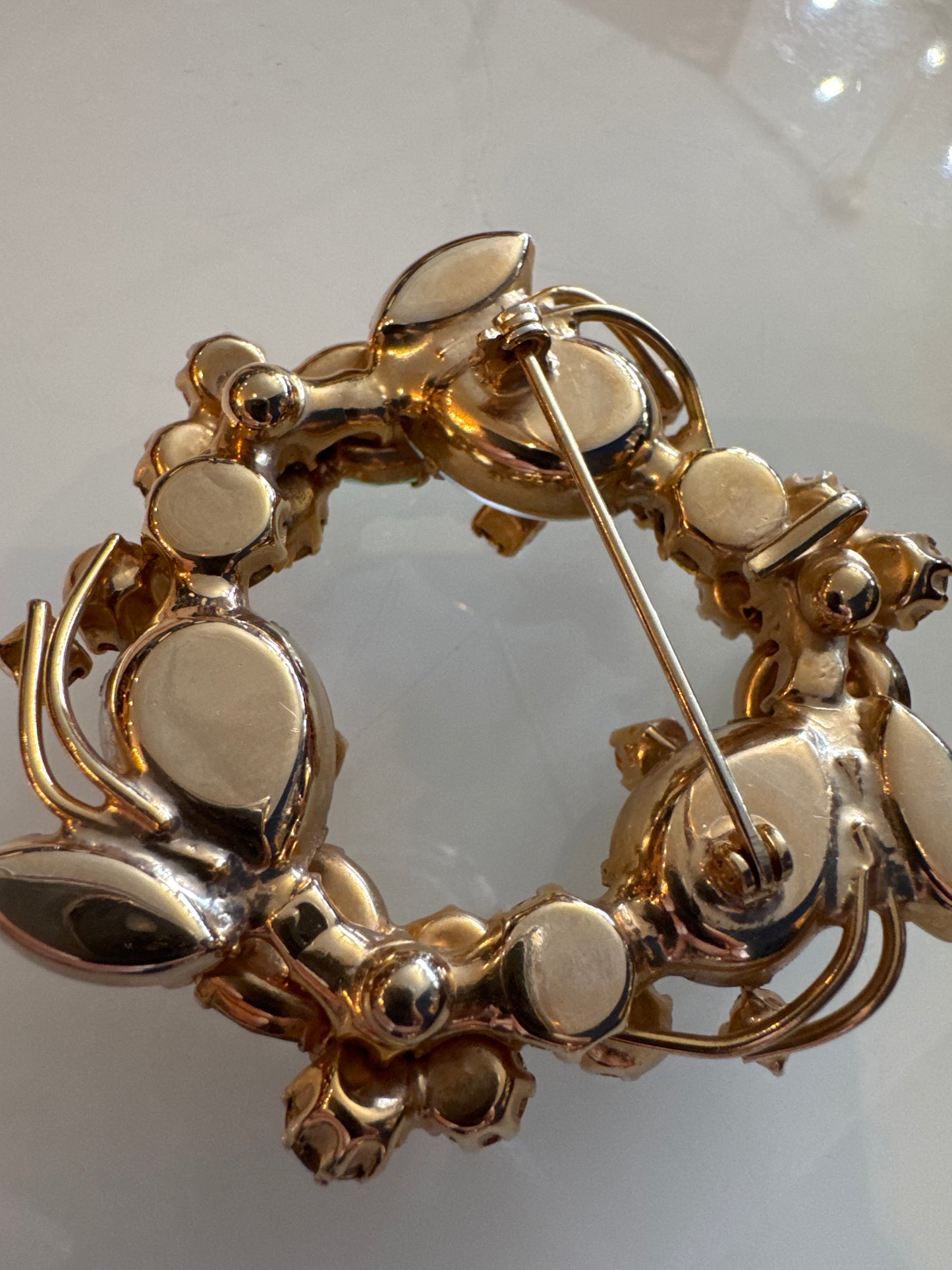 Stunning 1950s wreath brooch with milk, glass, moonstones, and layered petals made out of colored rhinestones