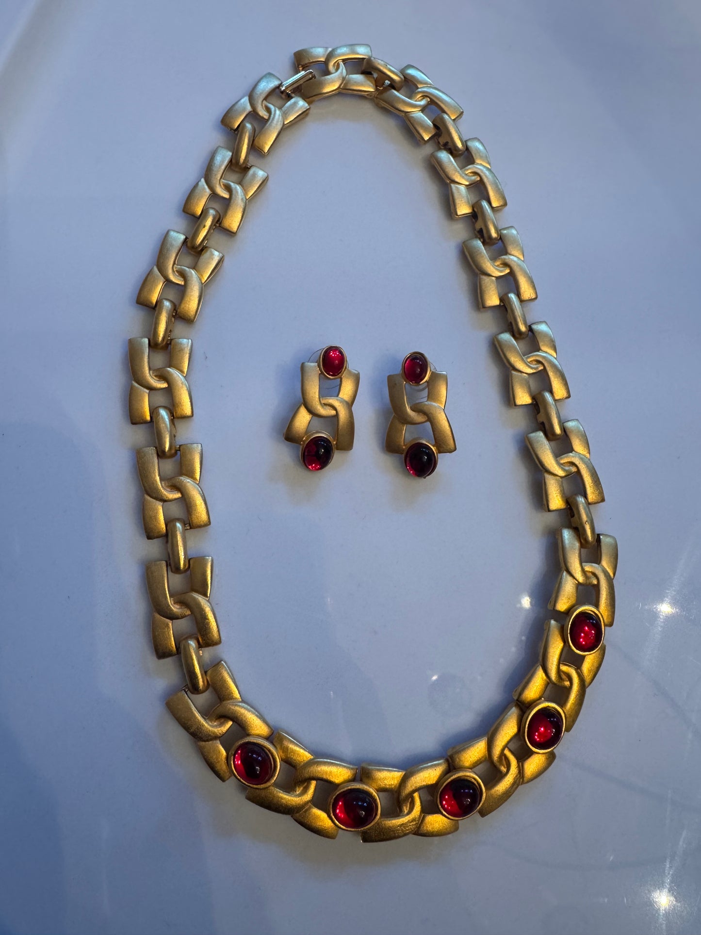 Beautiful 1980 red cabochon matte gold necklace with matching pierced earrings. Sold as a set.