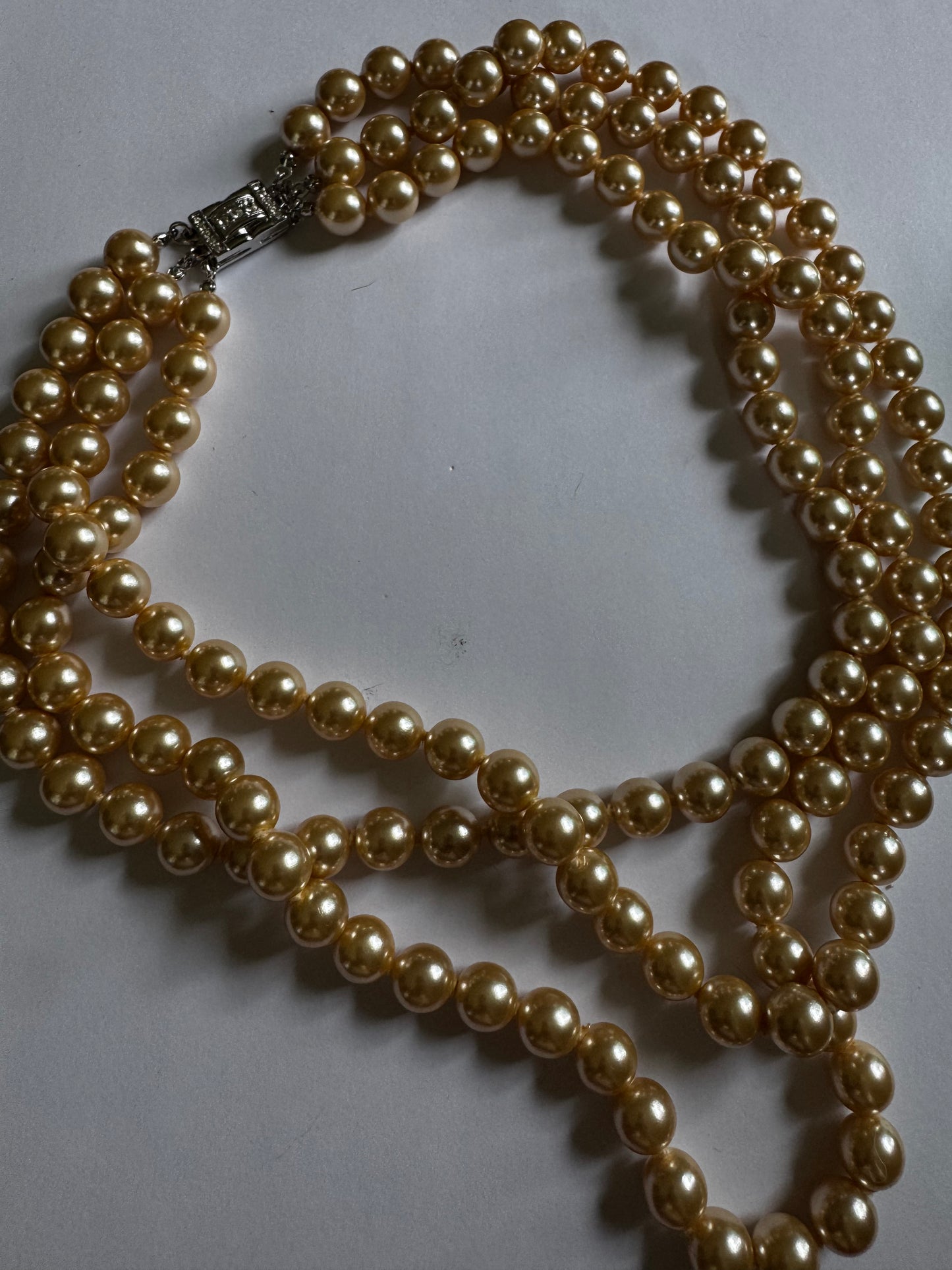 stunning 1960s Kenneth J Ln. triple strand neck, necklace of ivory faux pearls with gorgeous Silvertone rhinestone clasp