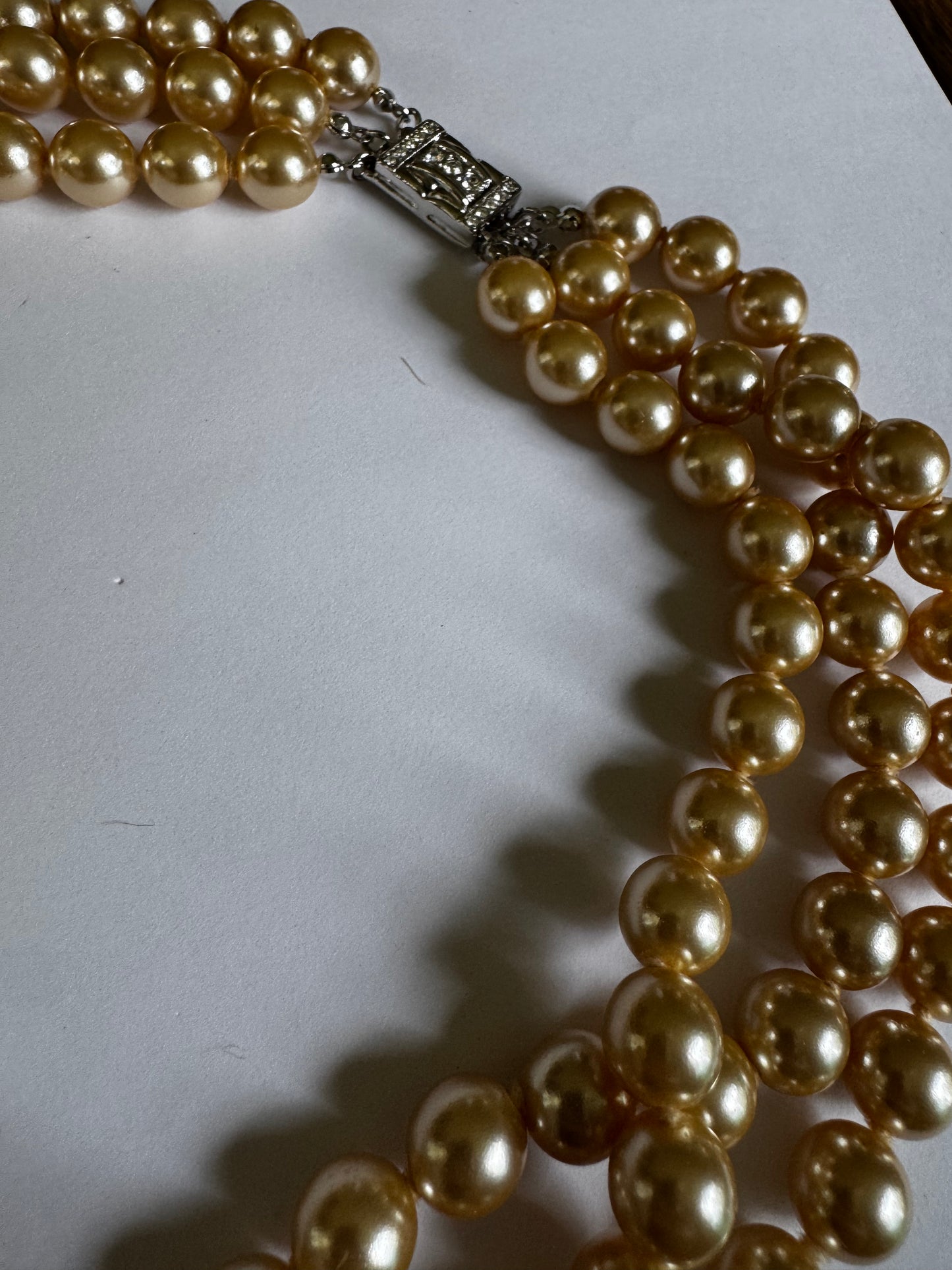 stunning 1960s Kenneth J Ln. triple strand neck, necklace of ivory faux pearls with gorgeous Silvertone rhinestone clasp