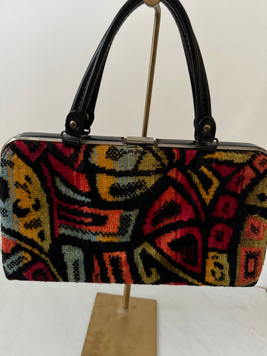 Vintage 1950s colorful black leather top handle handbag