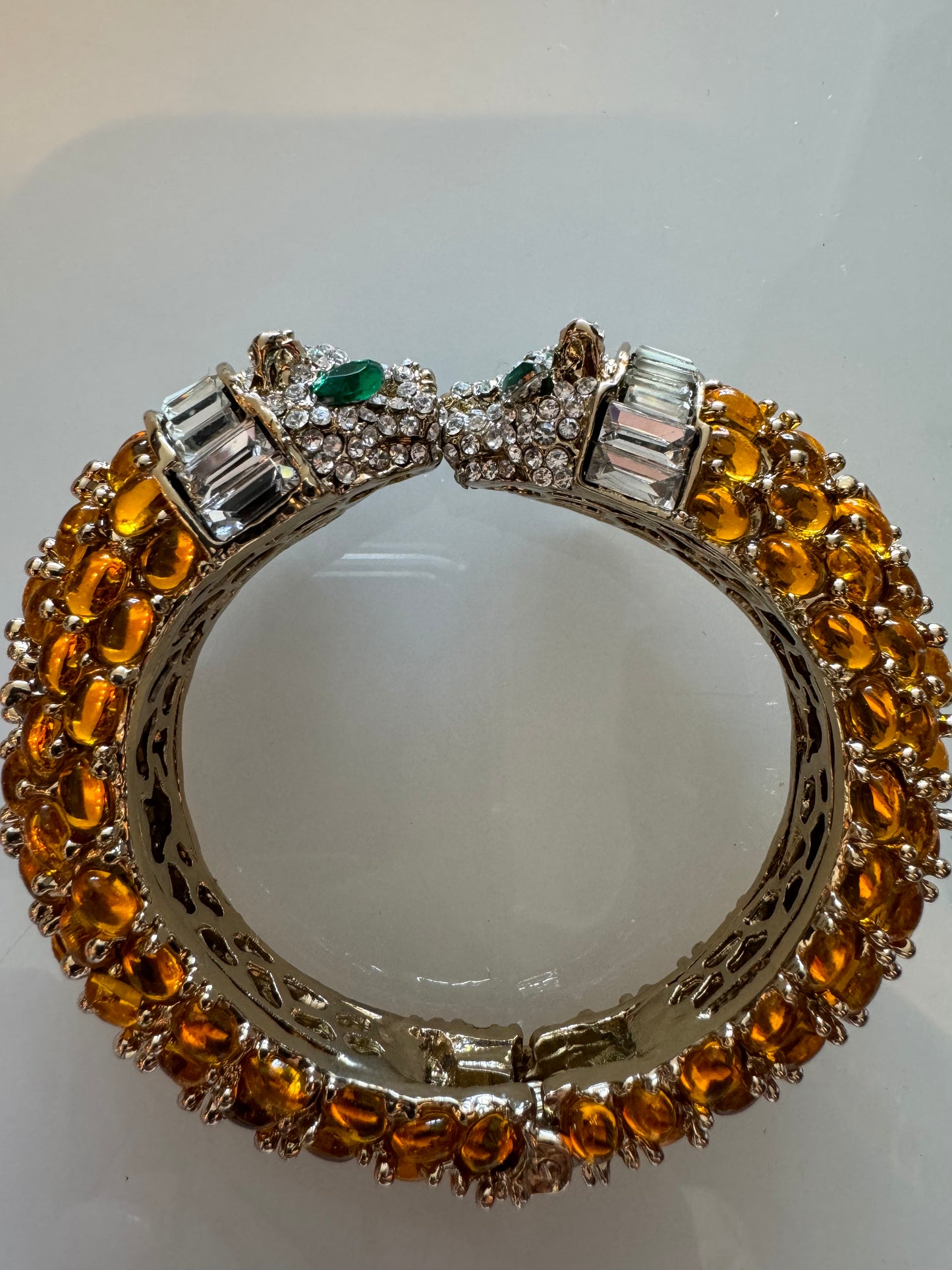 Retro clamper bracelet with amber stones and tiger face