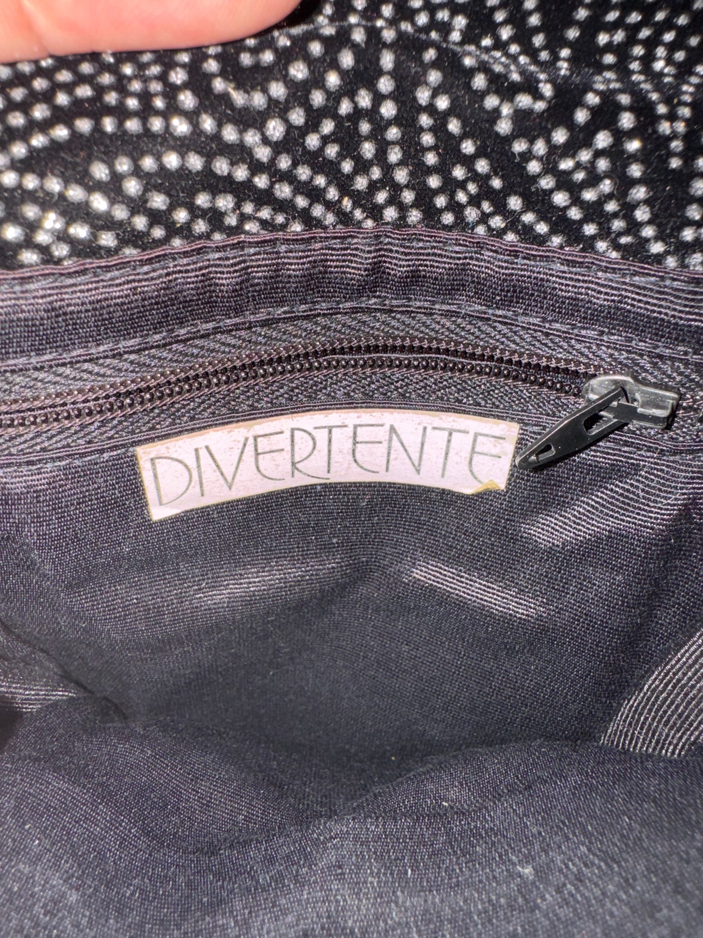 Vintage 1980s crossbody Italian black leather bag by Divertente. From the collection of Linda Fargo