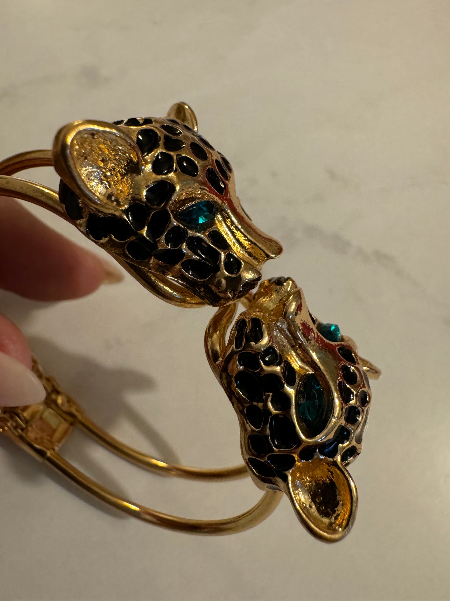 Vintage leopard gold tone clamper bracelet with green rhinestones