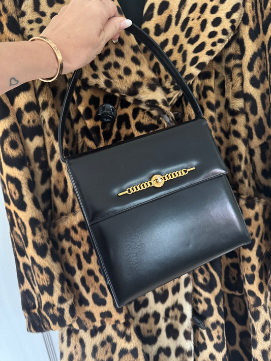 Beautiful 1950s black top handle bag by PRESTIGE, with stunning gold tone decorative detail