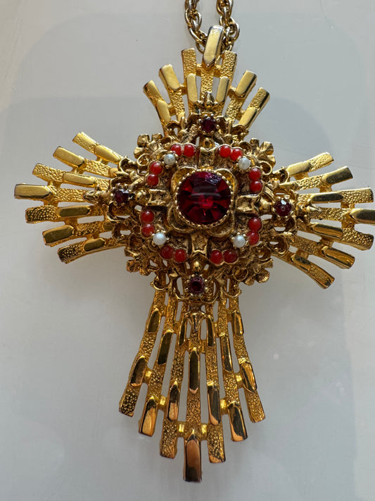 Beautiful 1970s cross in gold tone with orange and red rhinestones and pearls