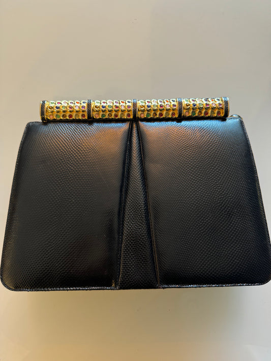 Vintage black snake Judith Leiber with jewel top, convertible clutch strap, original mirror and comb