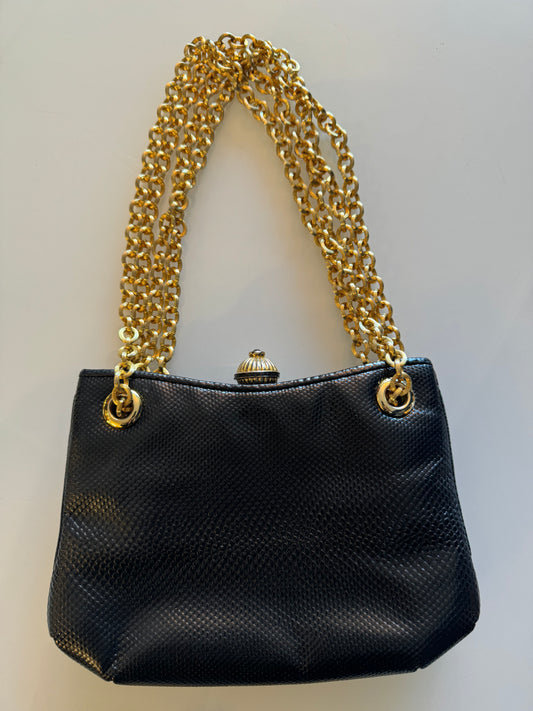 Stunning vintage Judith Leiber black snakeskin bag with double gold tone chain, kiss lock with 2 outer pockets and grosgrain interior