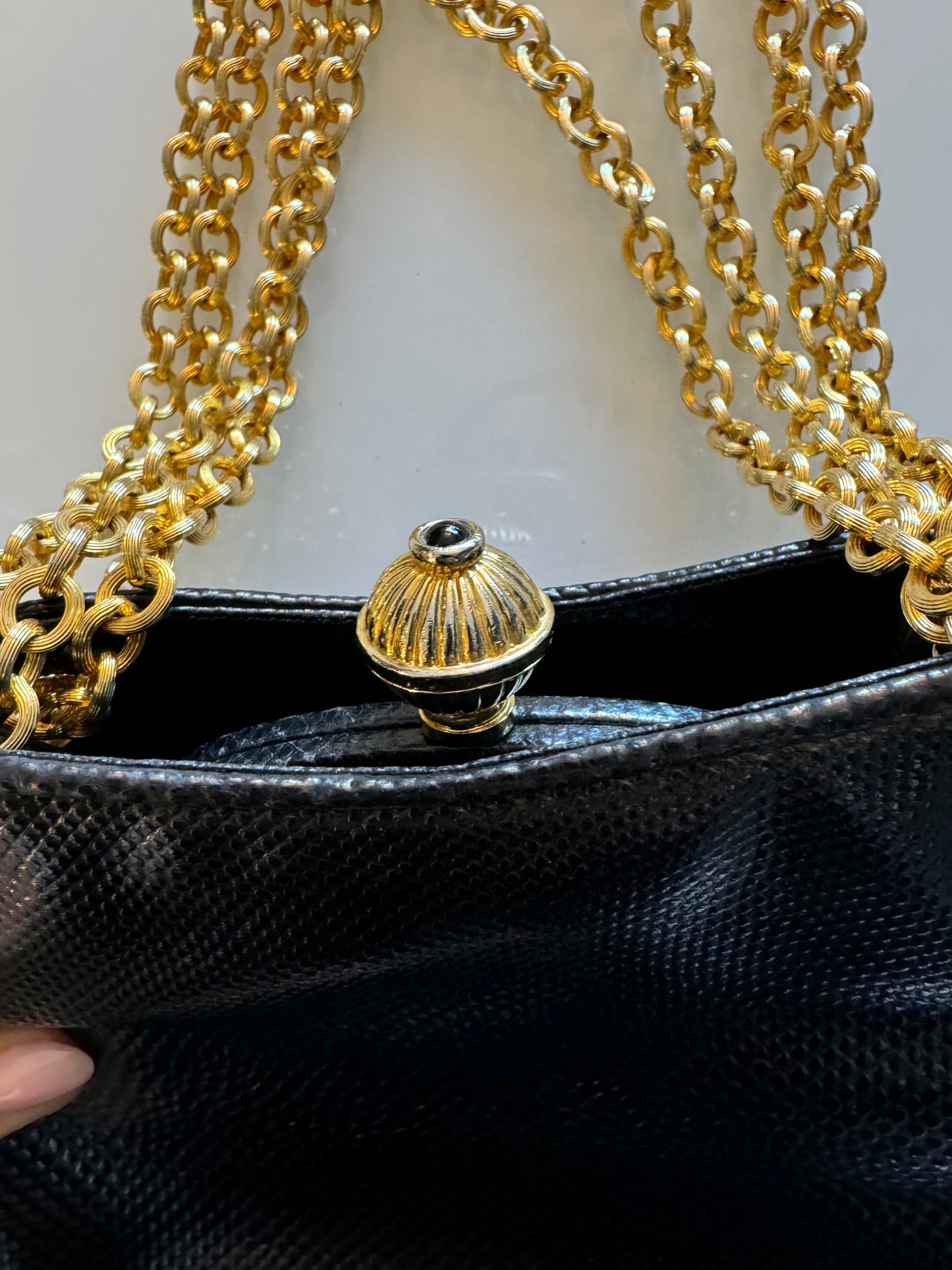 Stunning vintage Judith Leiber black snakeskin bag with double gold tone chain, kiss lock with 2 outer pockets and grosgrain interior