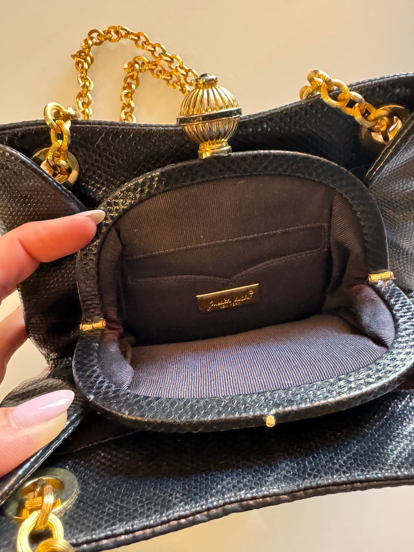 Stunning vintage Judith Leiber black snakeskin bag with double gold tone chain, kiss lock with 2 outer pockets and grosgrain interior