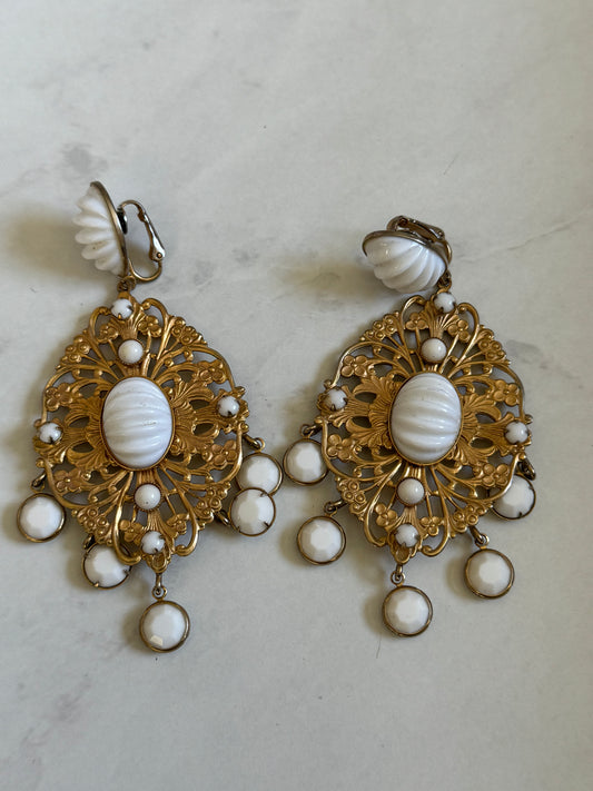 Gorgeous vintage KJL gold tone and white clip on earring