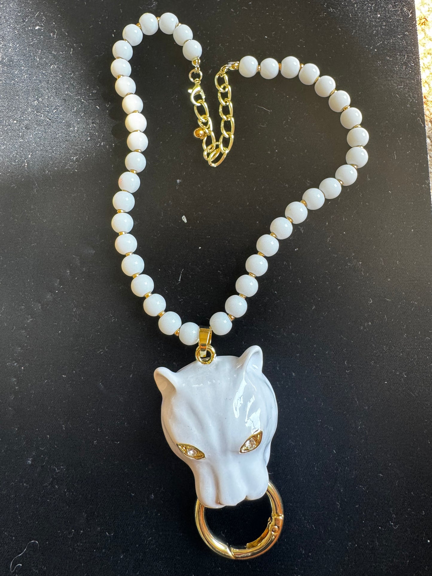 Fun 1990s white plastic lion-head necklace