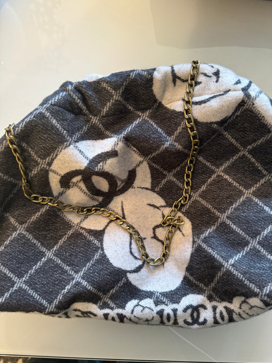 Vintage shawl reimagined as a clutch bag. Comes with chain shown.