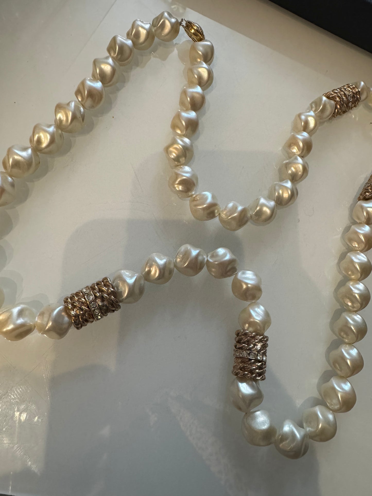1960s stunning, rare signed Trifari long strand of jumbo pearls with fabulous gold tone and rhinestone beads