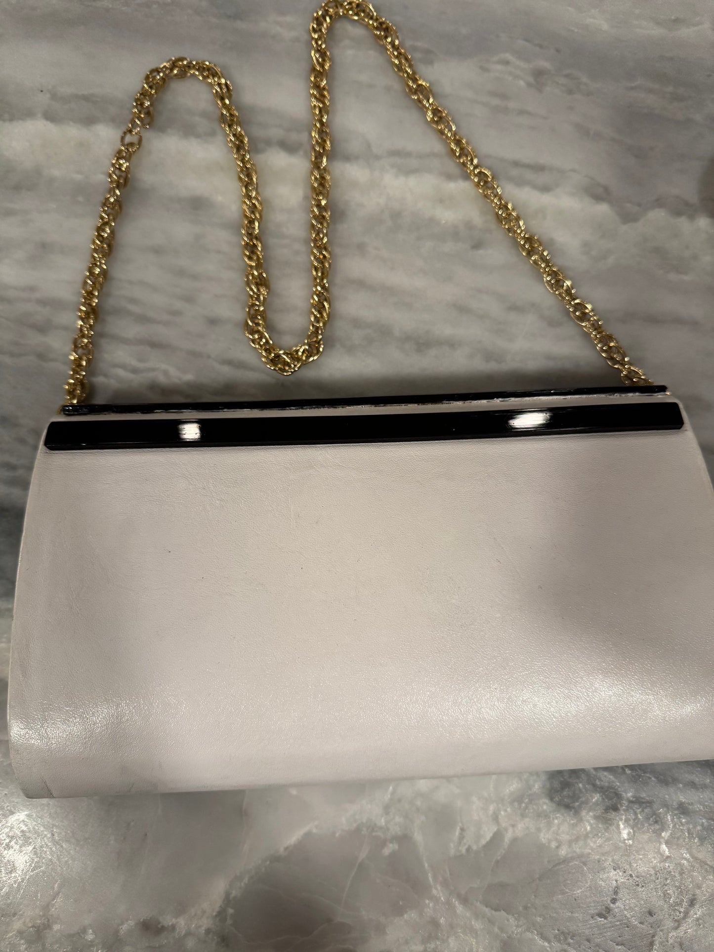 Vintage black lucite and white leather convertible clutch with gold tone chain bag. Made in Italy for Plymouth