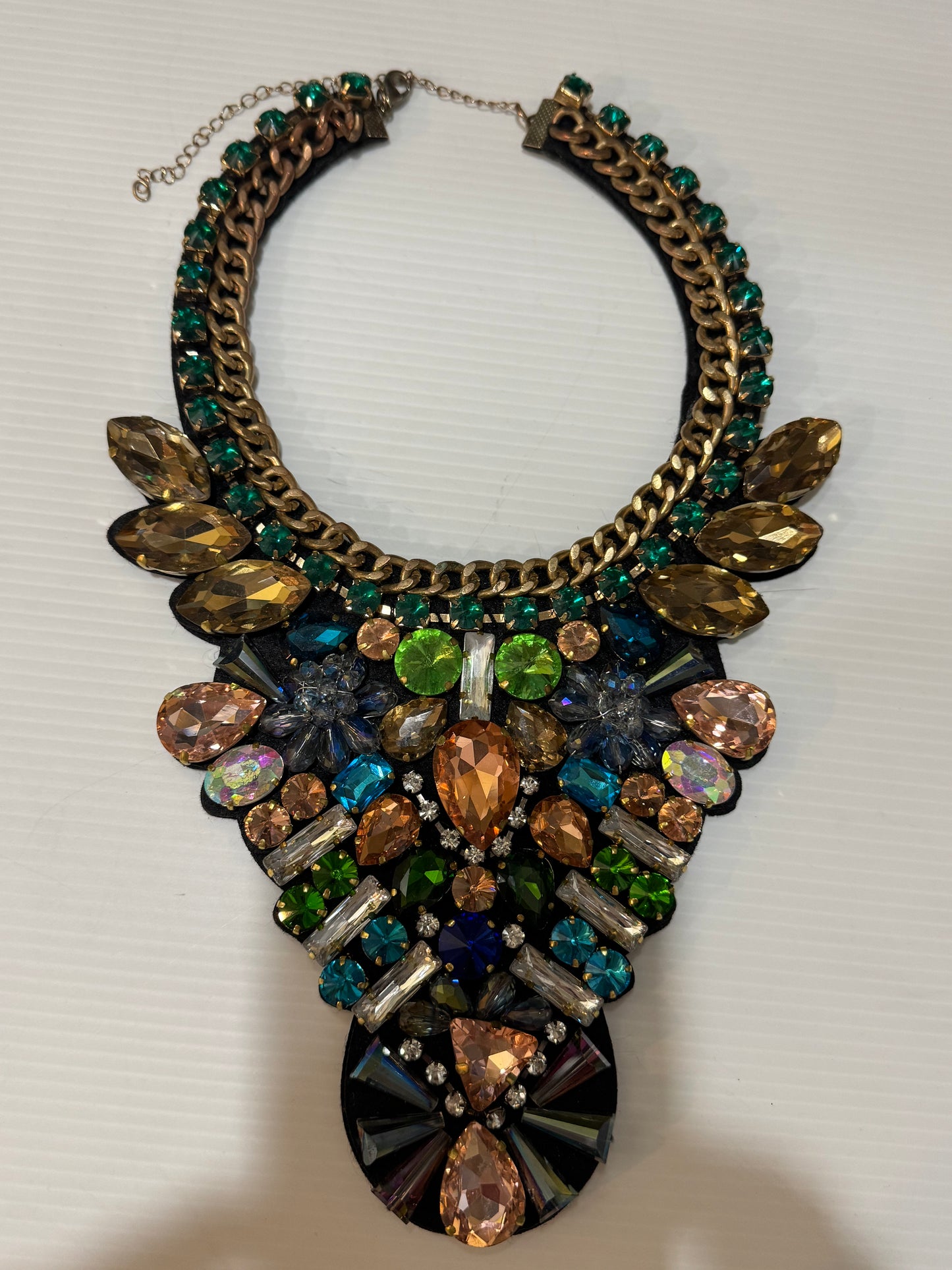 1980s massive bib necklace with rhinestones and gold tone chain, with felt backing. jackpot