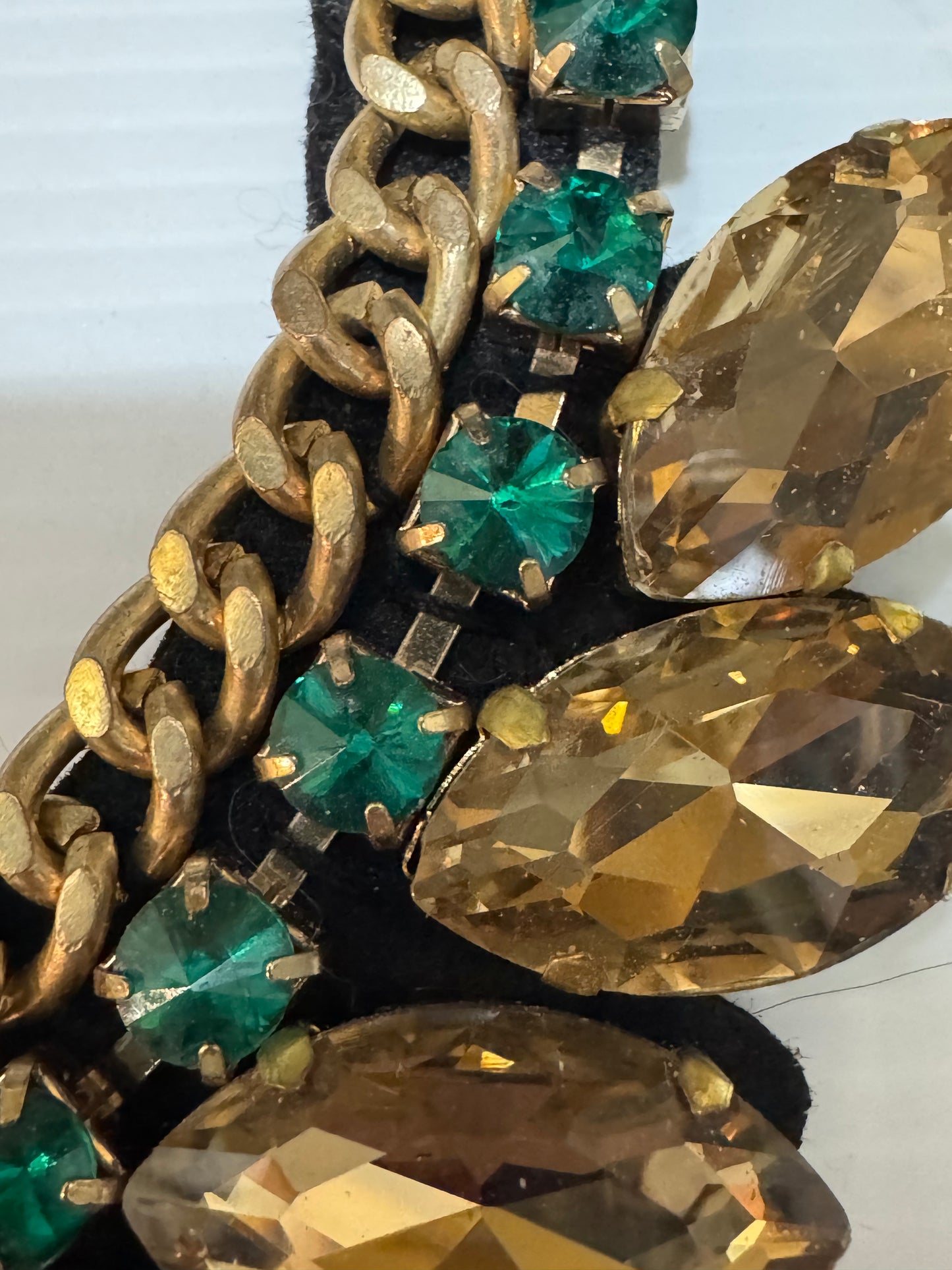 1980s massive bib necklace with rhinestones and gold tone chain, with felt backing. jackpot