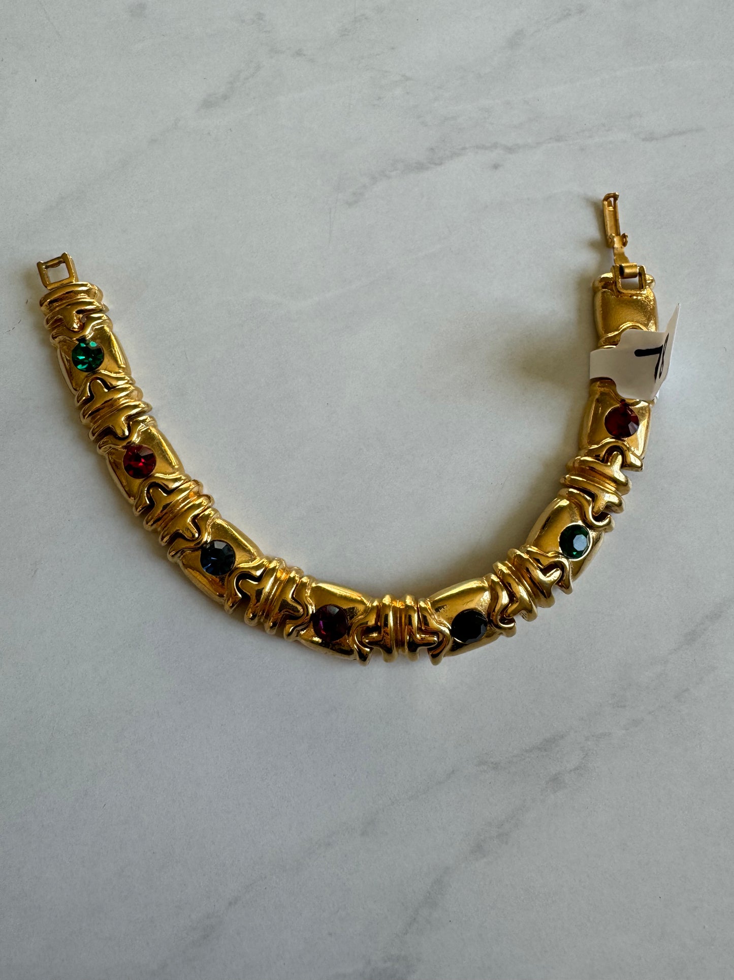 Fabulous for layering 1980s gold tone with colored rhinestones bracelet