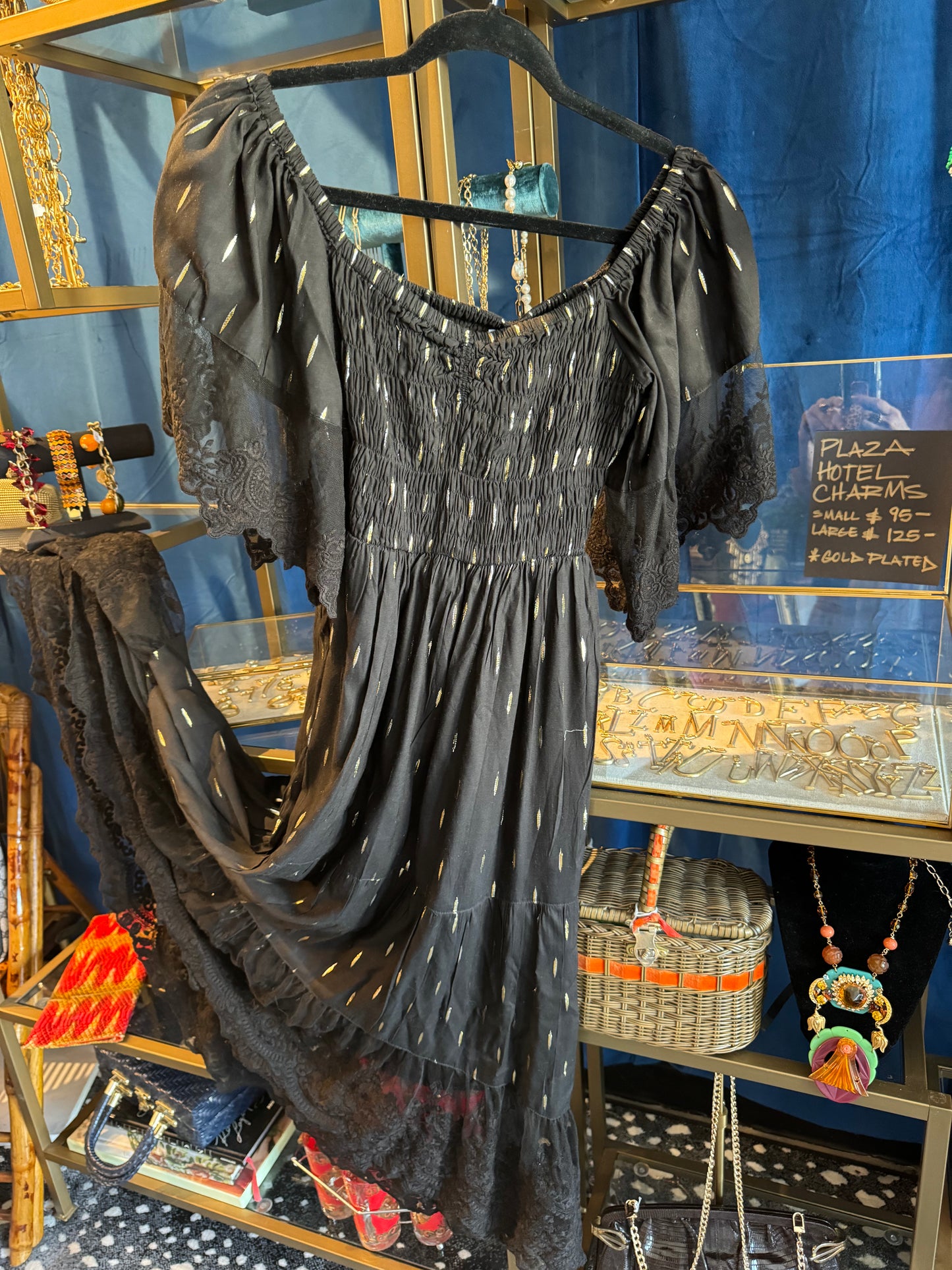 Easy, breezy black cotton and lace summer dress with gold accents. Can be worn on or off the shoulder