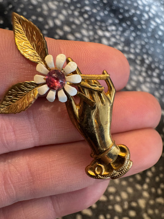 Vintage 1930s hand with flower goldtone brooch