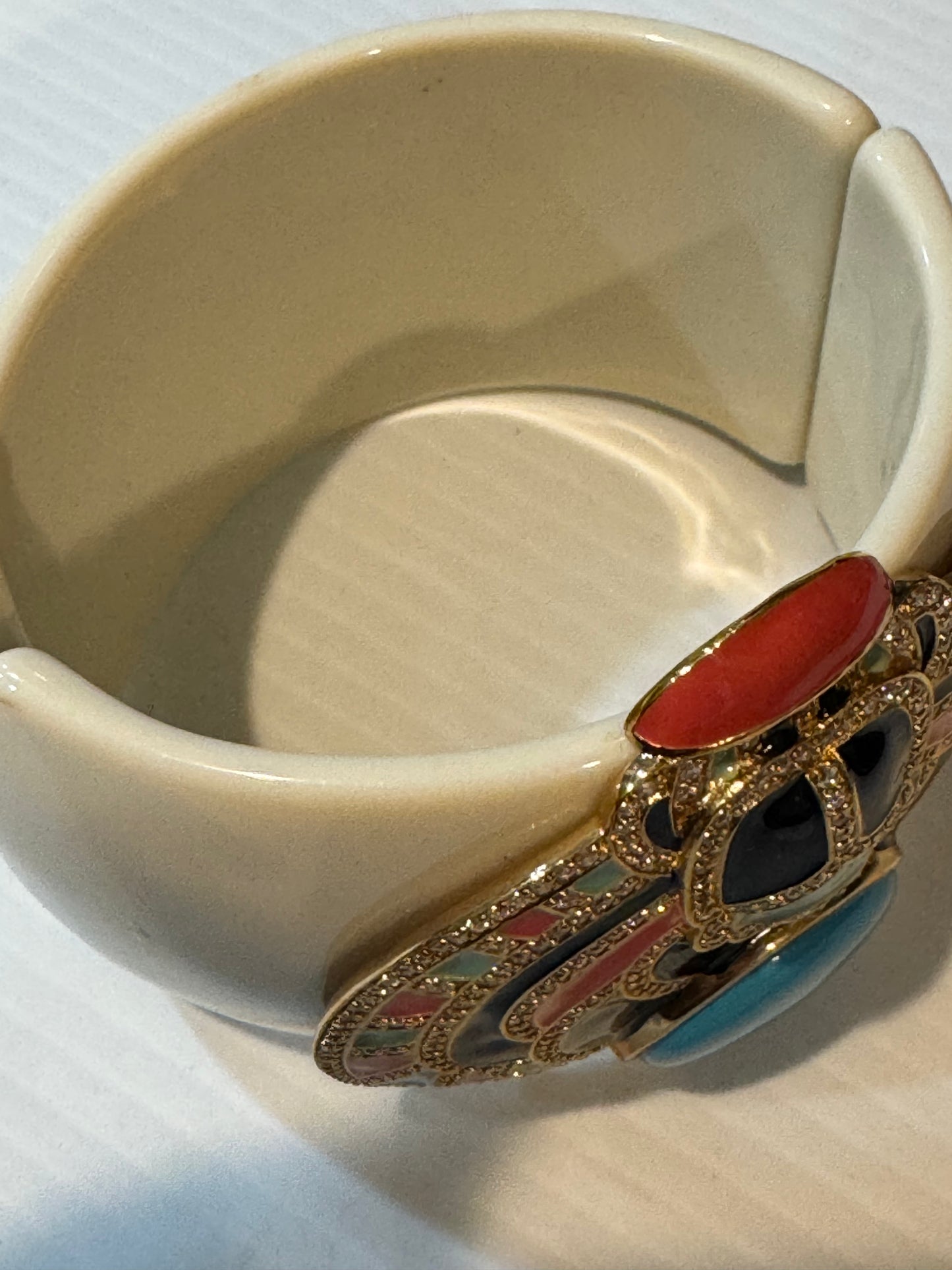 Early 2000s Kenneth Jay Lane CZ magnetic clamper/ cuff bracelet in ivory with turquoise colored stone / red & black enamel