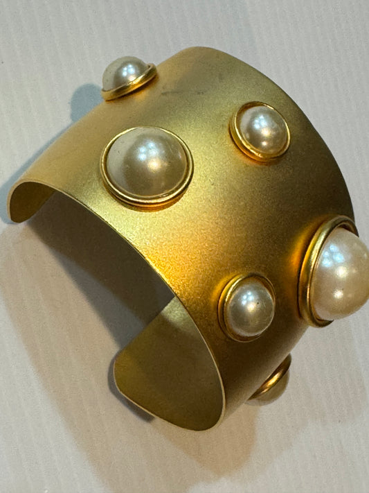 Jumbo 1990s gold tone cuff bracelet with pearls.